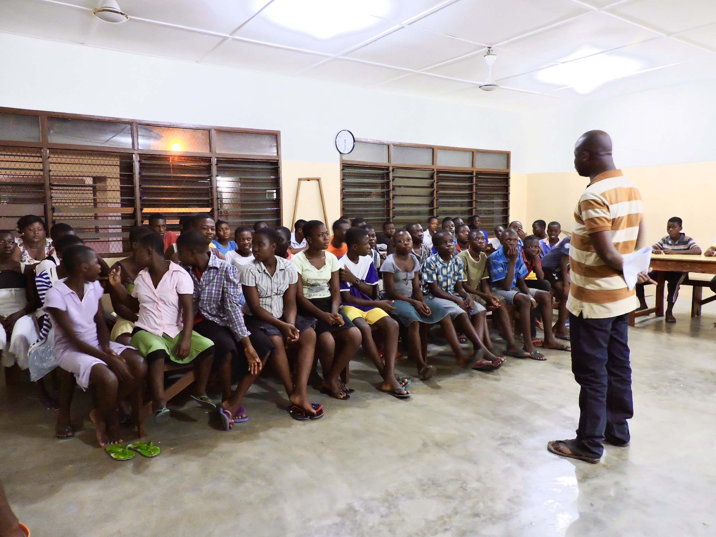 It was hard to get a picture of everyone sitting still! But here is Kofi doing introductions infront of the class at Madam Fo Ghana