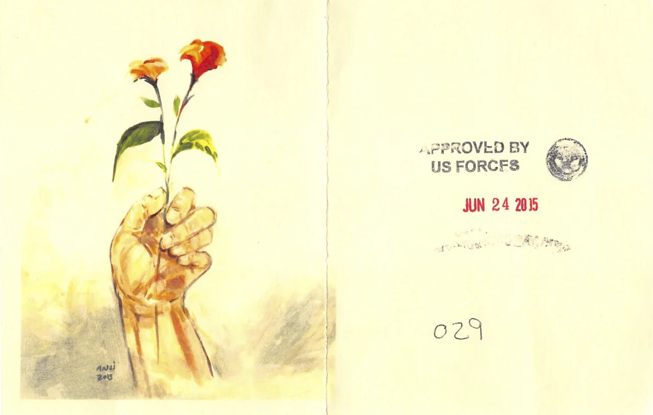 Muhammad Ansi, Hand Holding Red Flowers, 2015 (color photocopy of original and reverse, showing stamps indicating approval for release from Guantánamo).