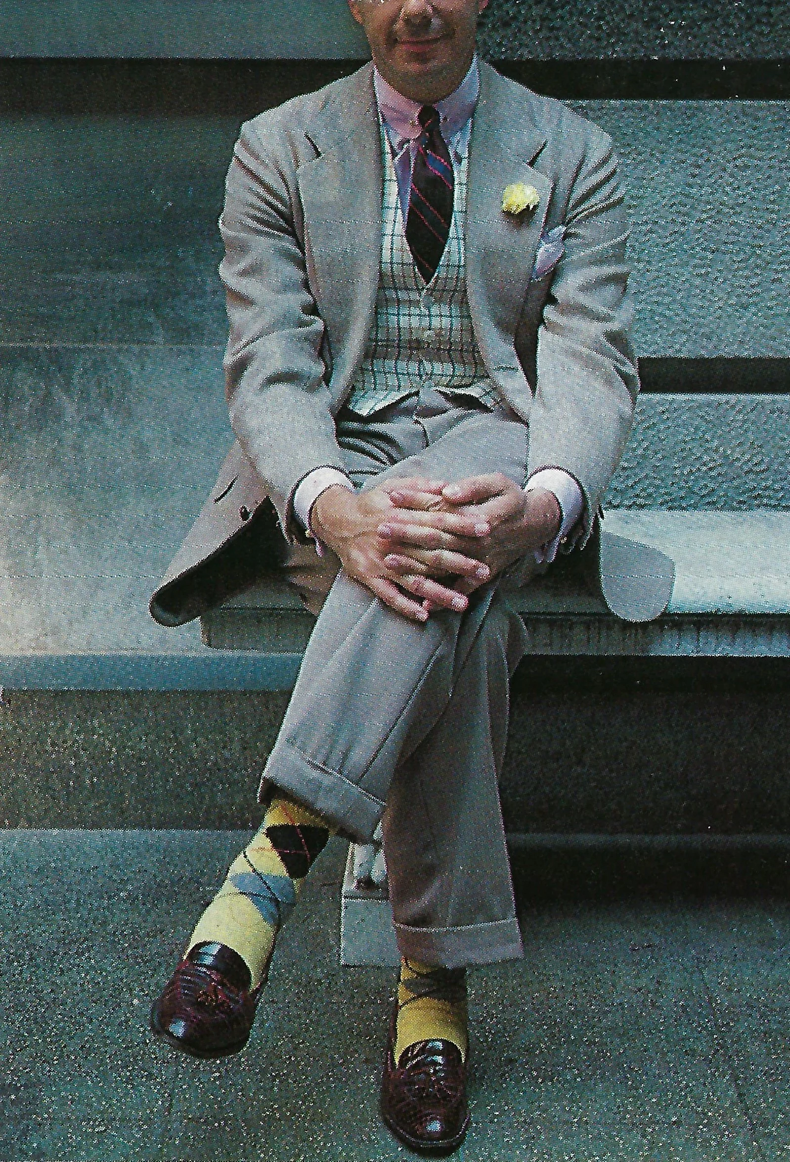 Rus in urbe: pinned club collar, repp tie, cream wool tattersall waistcoat, fawn garbardine suit, hand-framed argyle socks, and crocodile loafers.