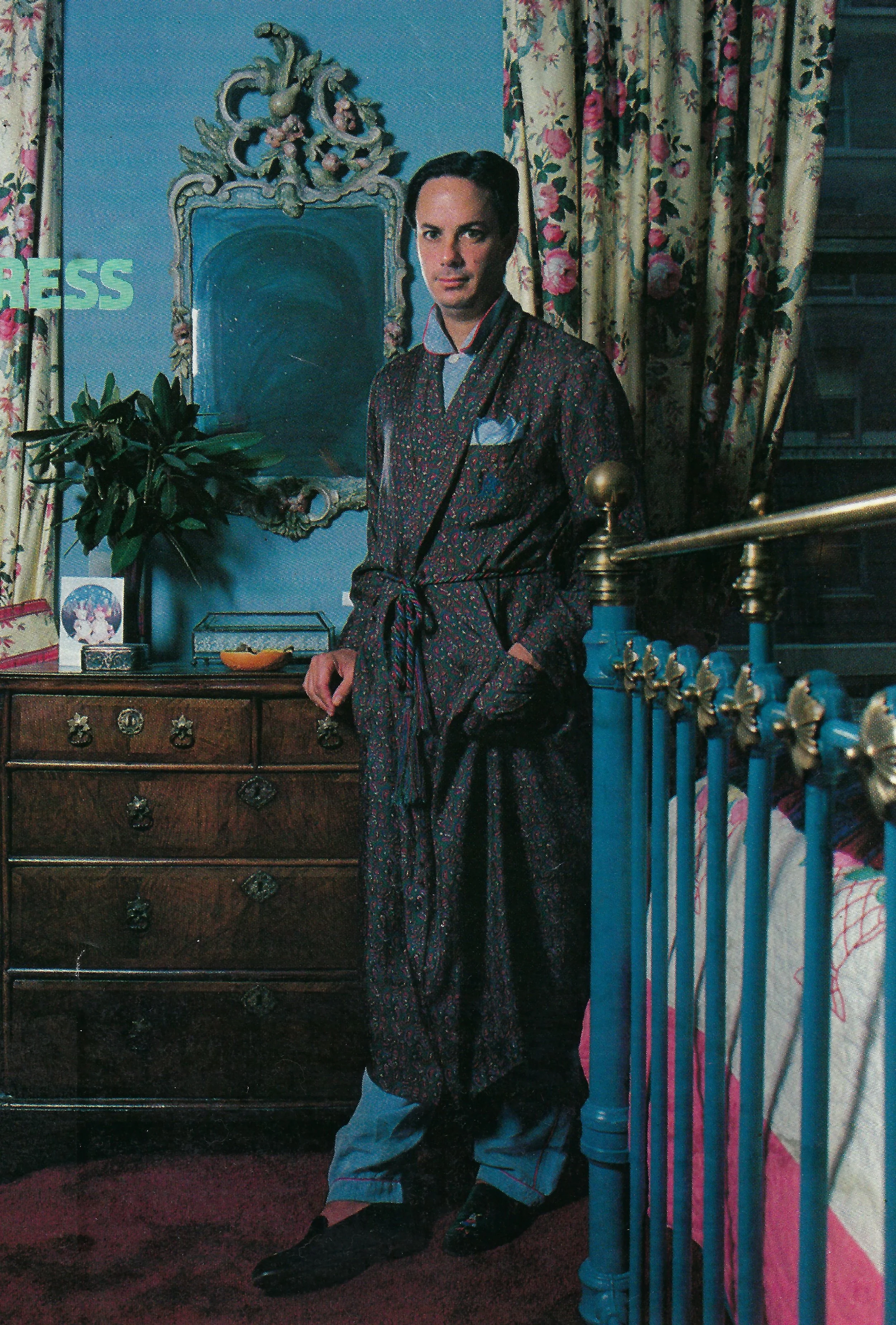 Alan wears an ancient madder silk dressing gown over silk pajamas and velvet slippers in this boudoir ensemble. The monogrammed breast pocket carries a pocket square, of course!