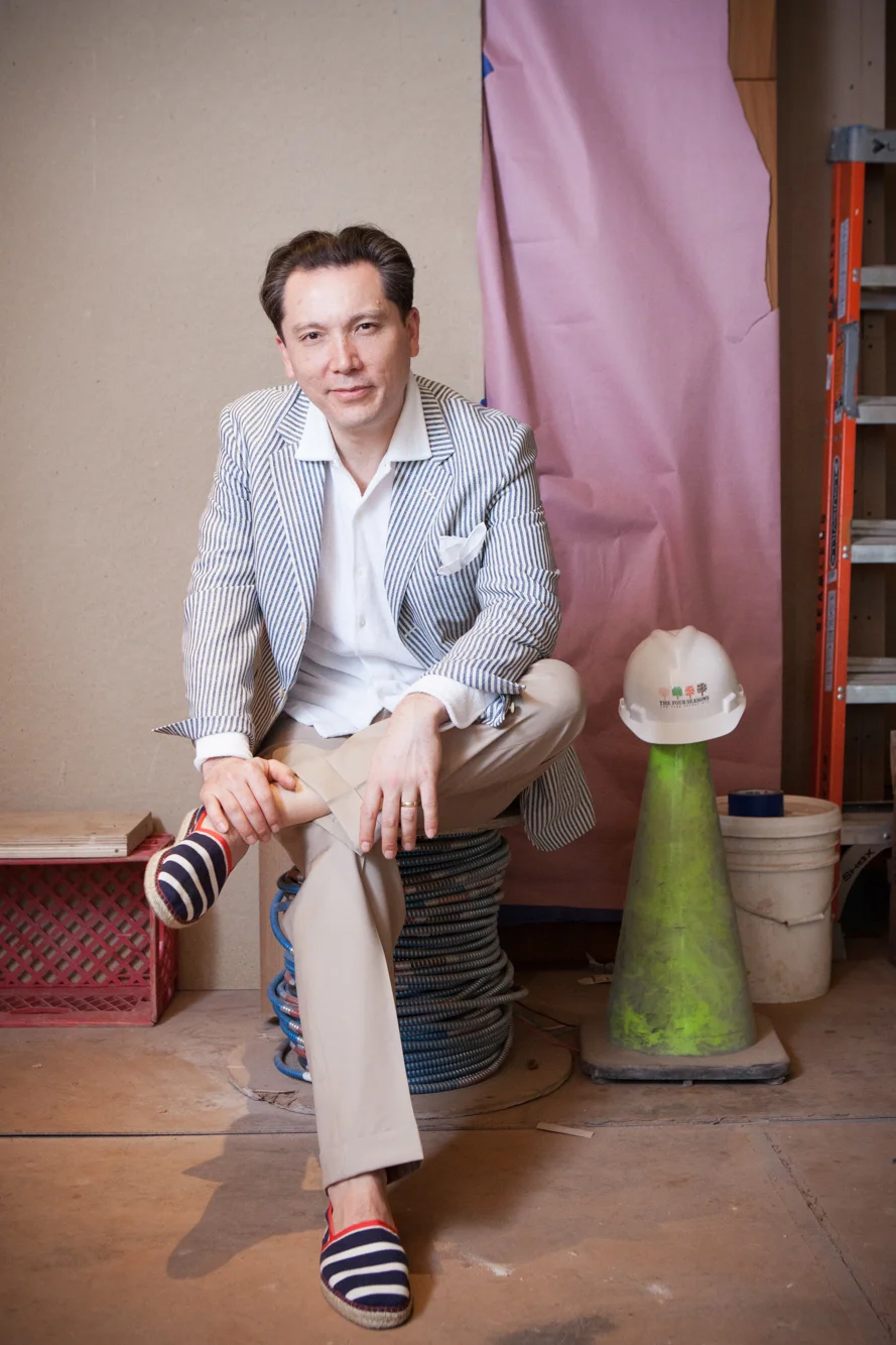 Slumming on Park Avenue: Andrew’s espadrilles and terry cloth shirt evoke the soft shape of things to come: livable fashion. 
