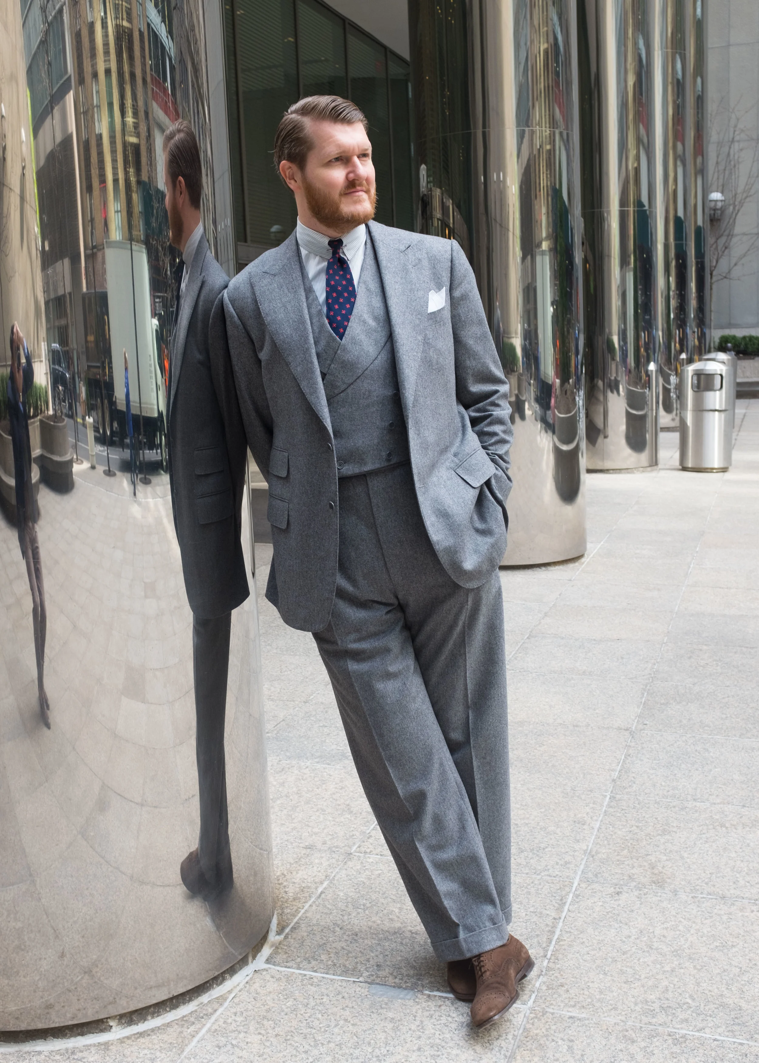 Crowley’s made-to-measure suit and bespoke waistcoat from Alan Flusser Custom.