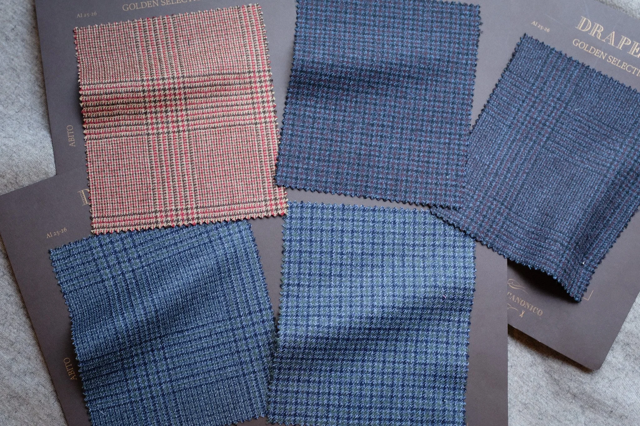 Navy, slate blue, and brown fabrics