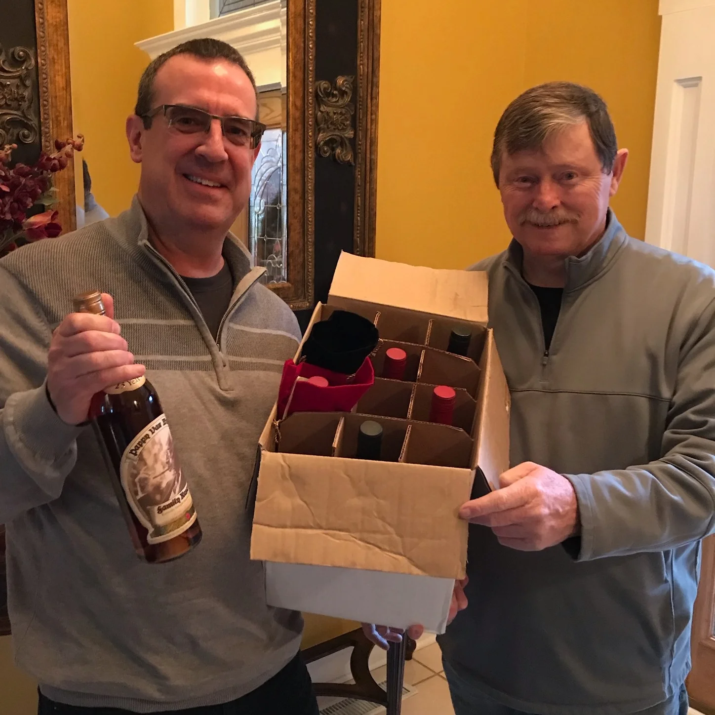 Mr. Allen shown here with Board Chair Jerry Stith - and his new set of Pappy Van Winkle.