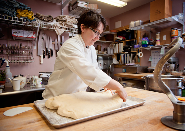 Maria Brennan lays out dough for croissants at The Victorian Bakery.