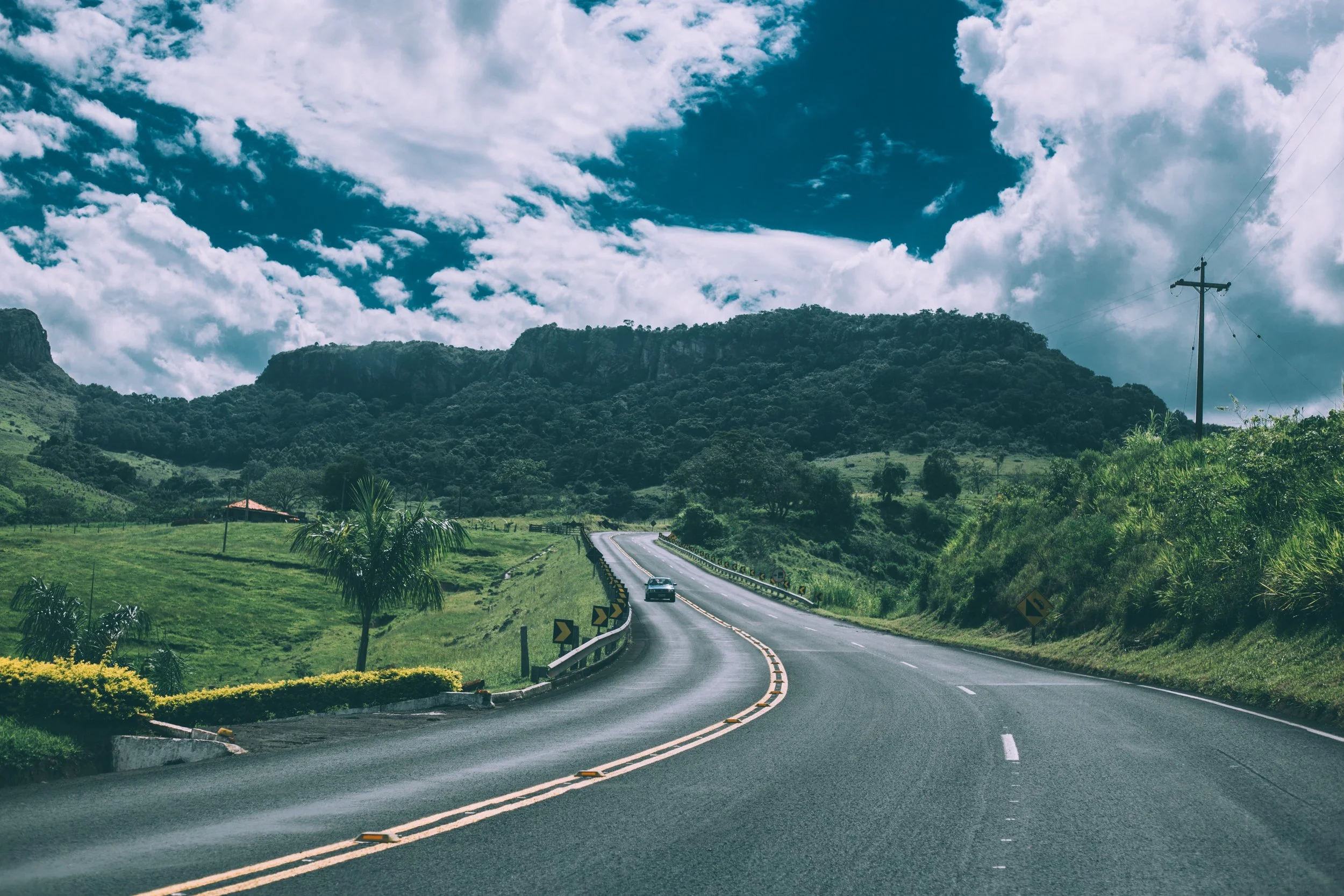 car-clouds-countryside-57645.jpg