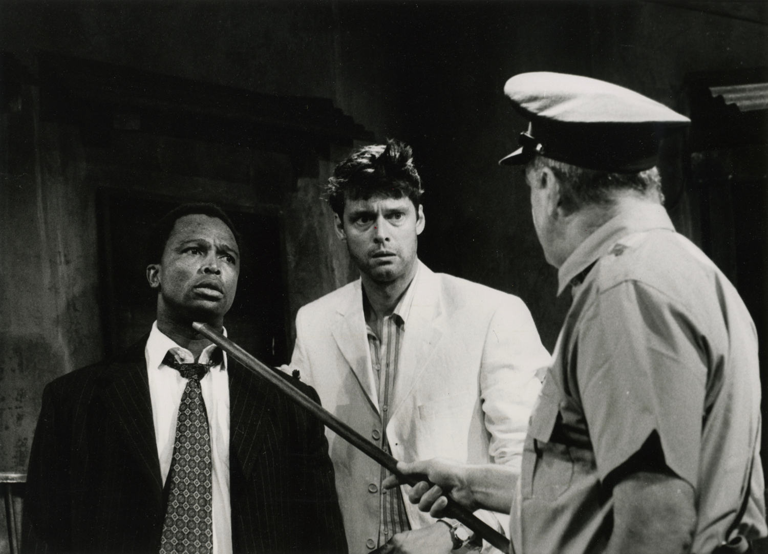 Sello Maake Ka-Ncube as Can Themba, Stephen Billington as Sylvester Stein and Jon Cartwright as Sergeant Bezuidenhout. Photo: Sarah Ainslie.