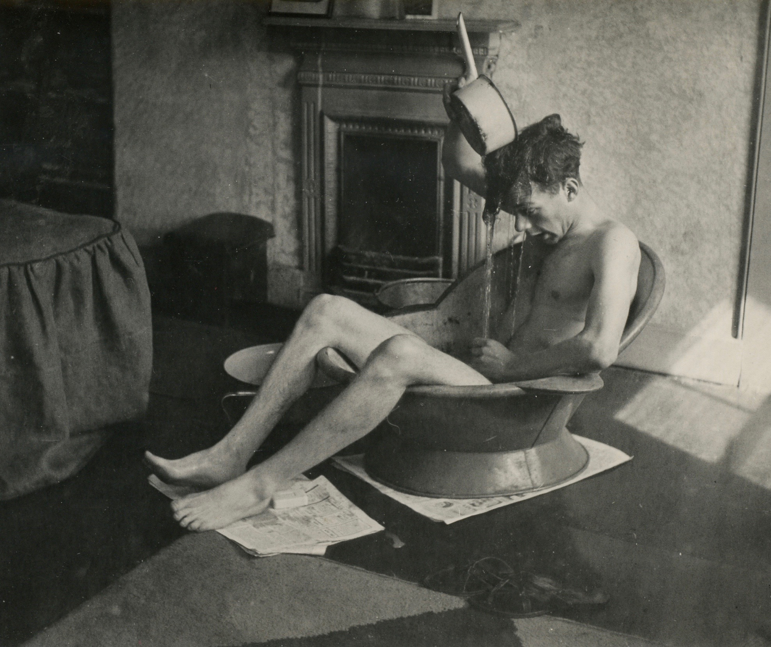 Sylvester having a bath in a New Compton Street tenement