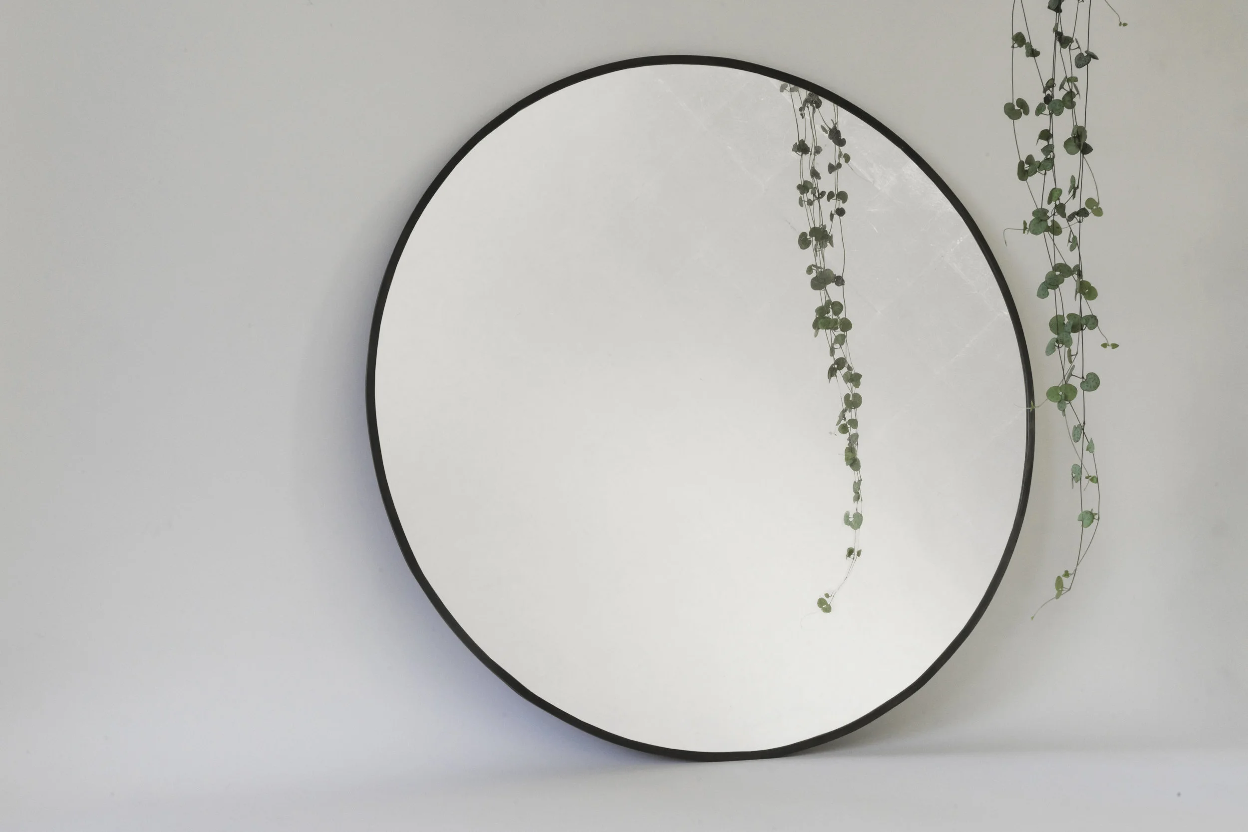 Perlucio Mirror
