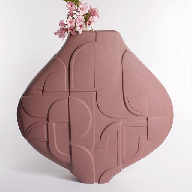 Yesterday I posted a similar piece coming out of the mold, here is a glaze fired finished vase: Fractal Moon Vase in Rose is a meditation on geometric abstraction and curvilinear form. The slim profile and height makes it perfect for a side table.  T