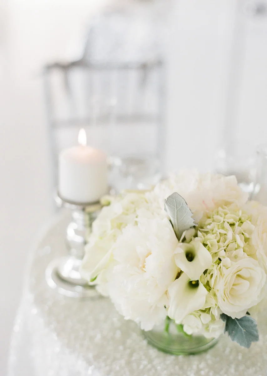 White flowers on white sequin linen