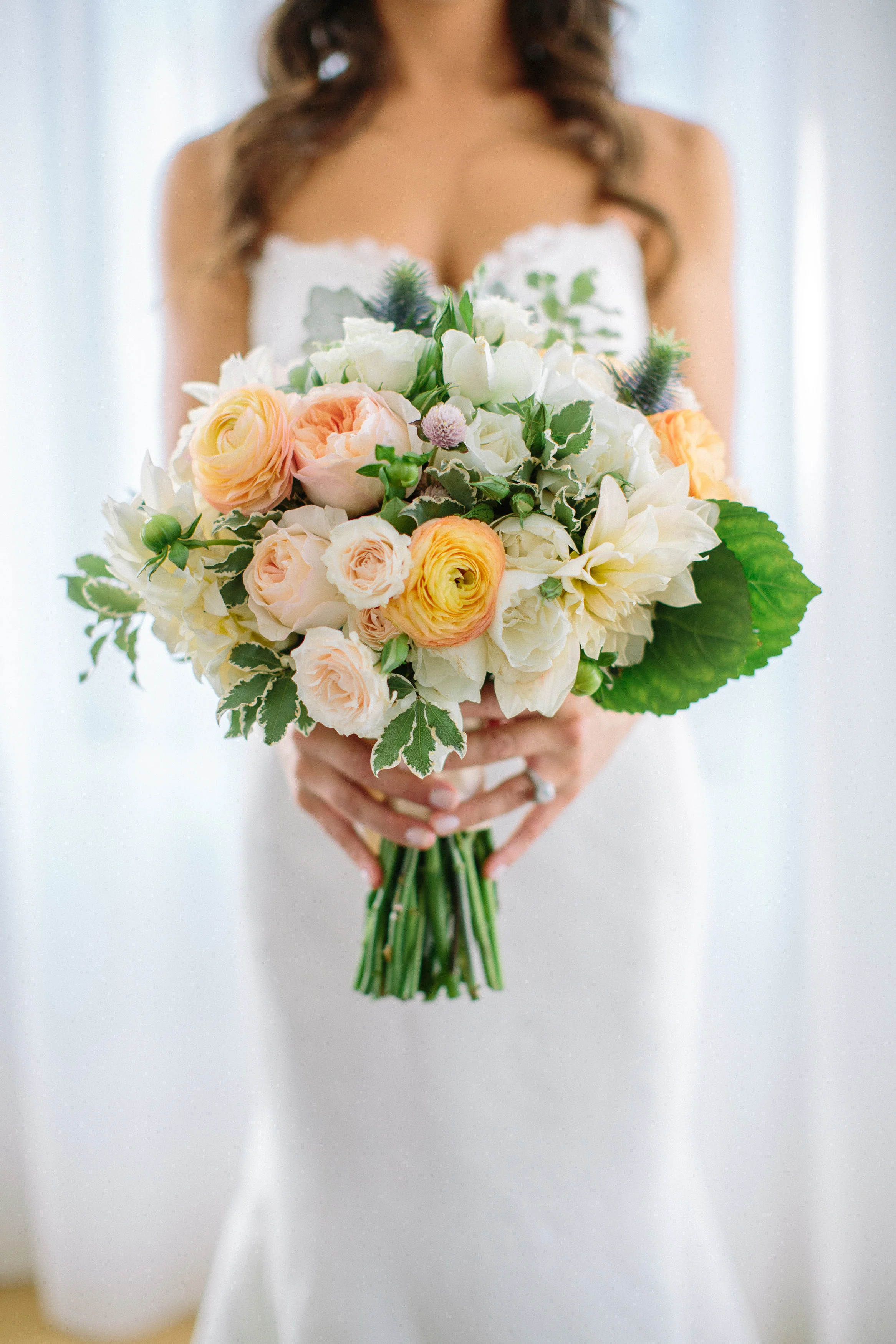 Coral and cream bridal bouquet