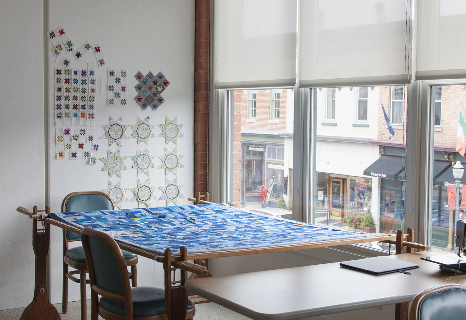 hand quilt frame by the window.jpg