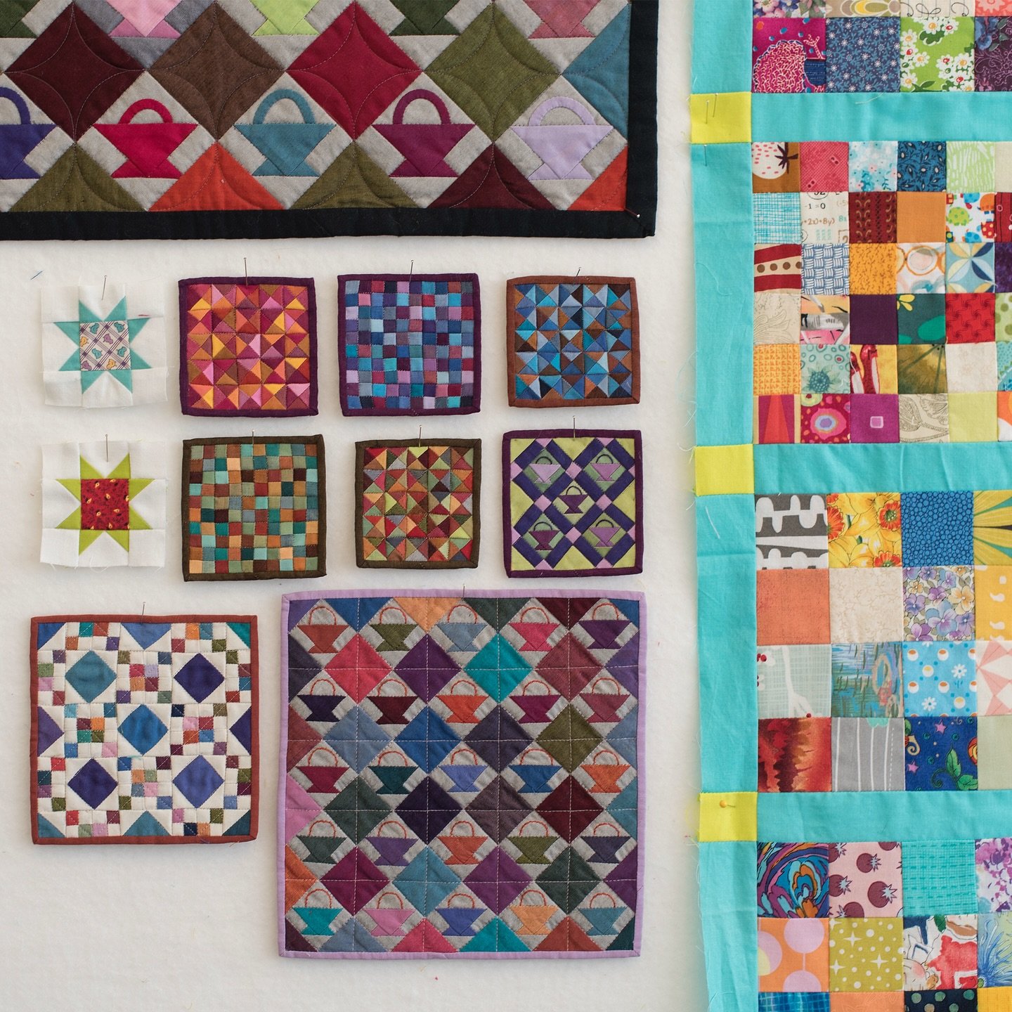 A growing collection. 

#whatsonyourdesignwall #ridiculouslytinyquilts #sewtiny #sewsmall #sewsolid #fiberarts #textileart