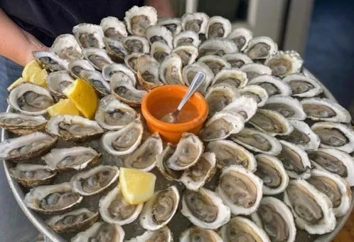 Question: Where else can you get your fill of freshly shucked Oysterponds, Peconic Gold &amp; Peeko oysters all in one place at the same time?
Answer: The New Suffolk Waterfront Fund&rsquo;s Summer Soiree!
Get your tickets while you can to this beaut