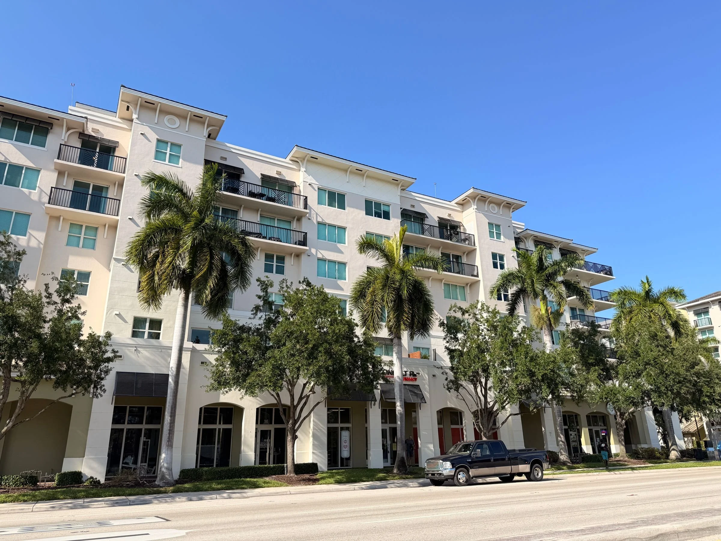 Apartment building with palm trees