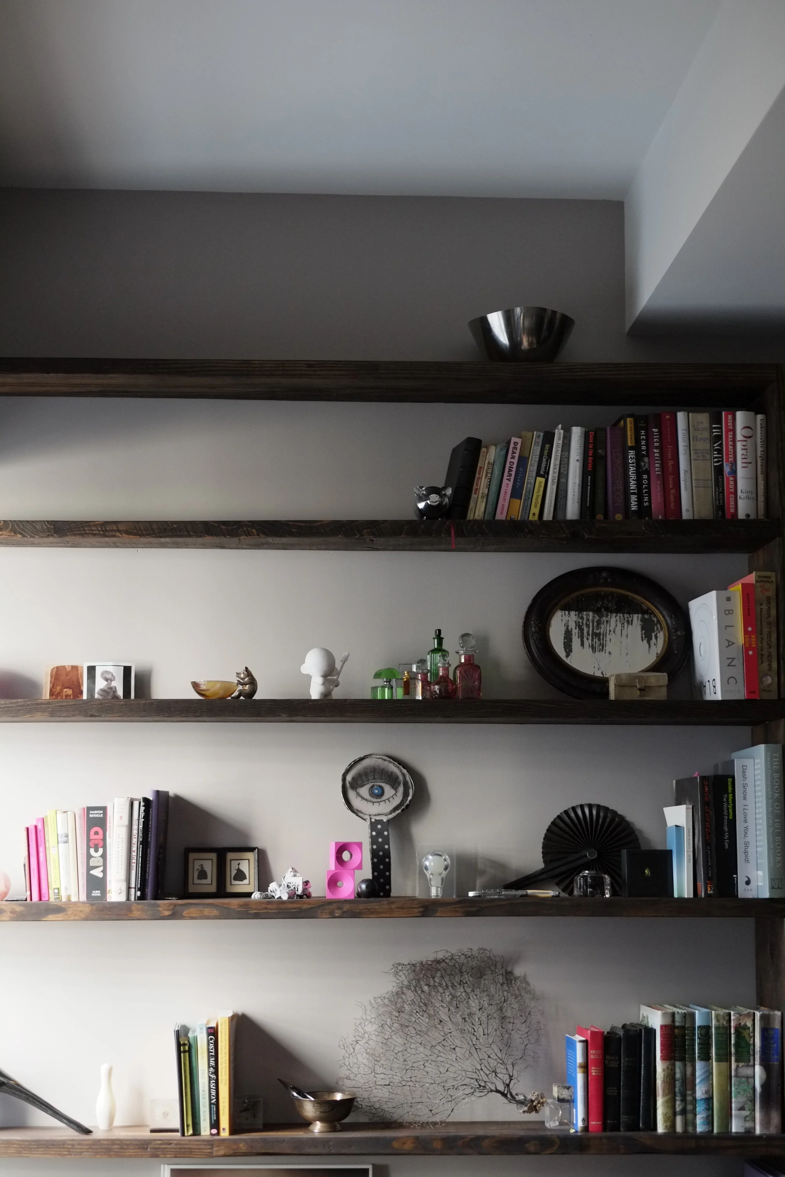 Floating reclaimed wood shelves