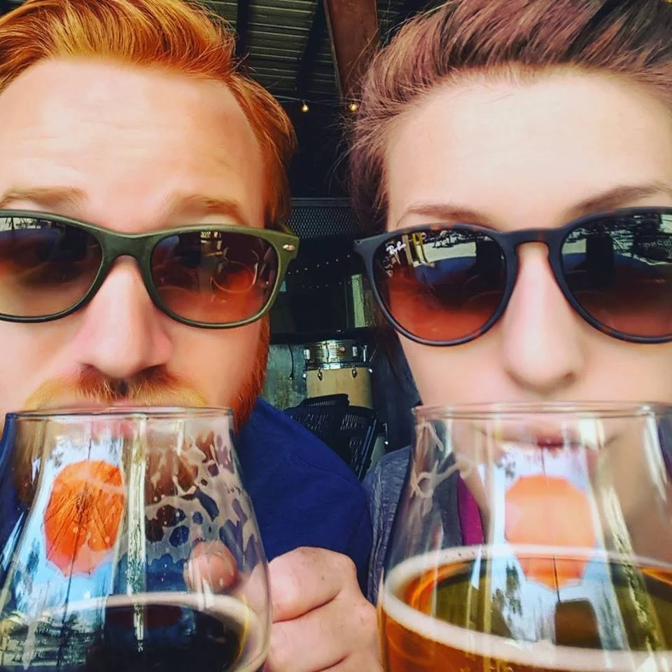 My wife and I after a walk to our neighborhood brewery, Secondline Brewery.