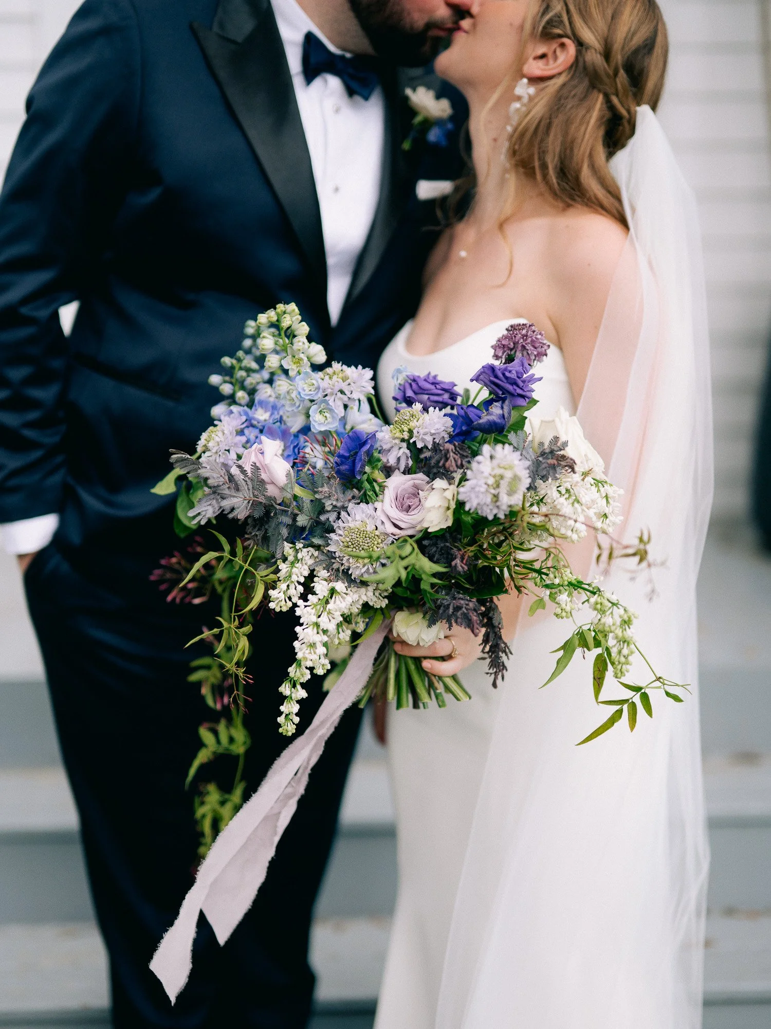 bride and groom portrait with flowers