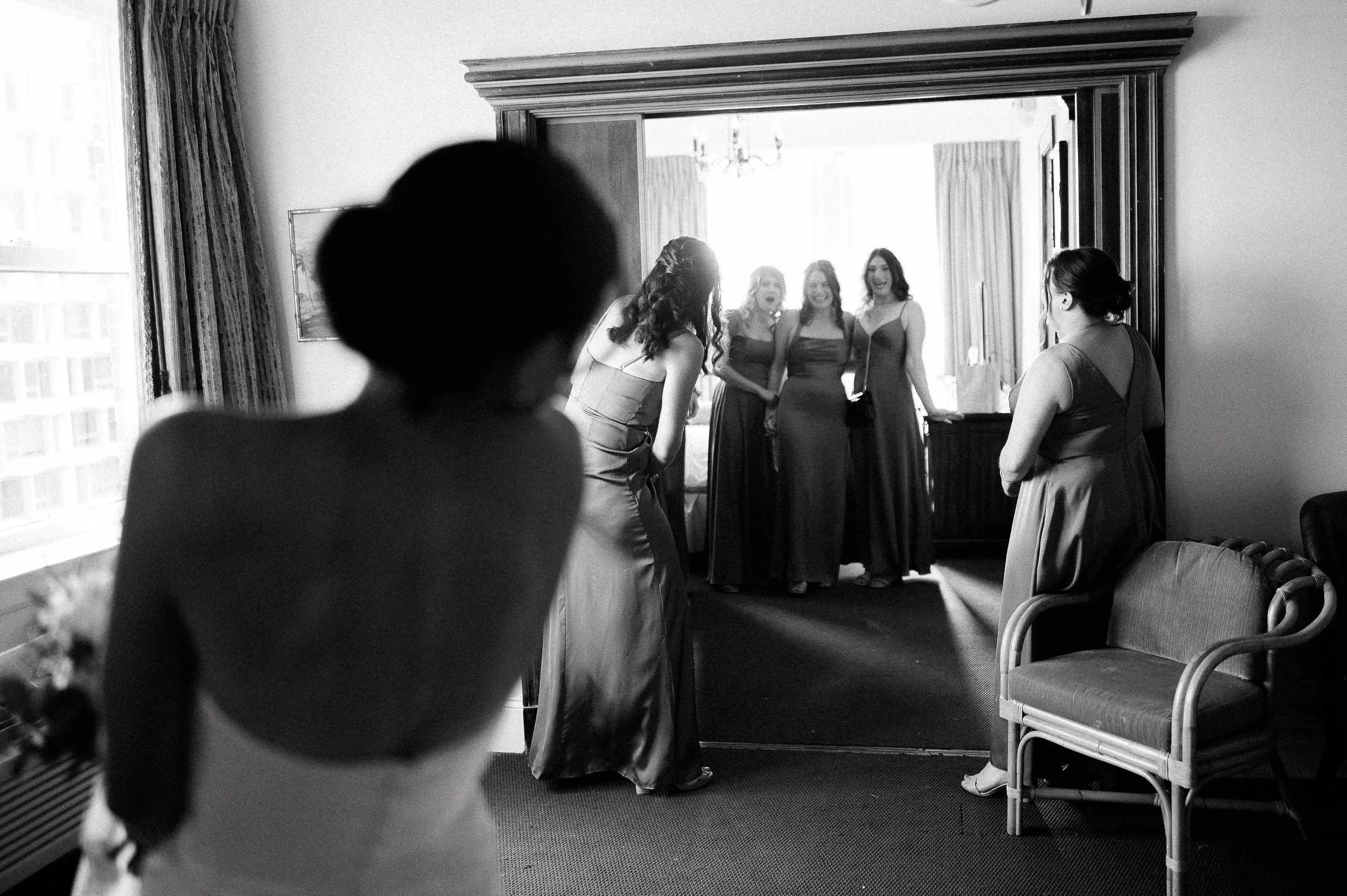 bridesmaids first look with bride candid