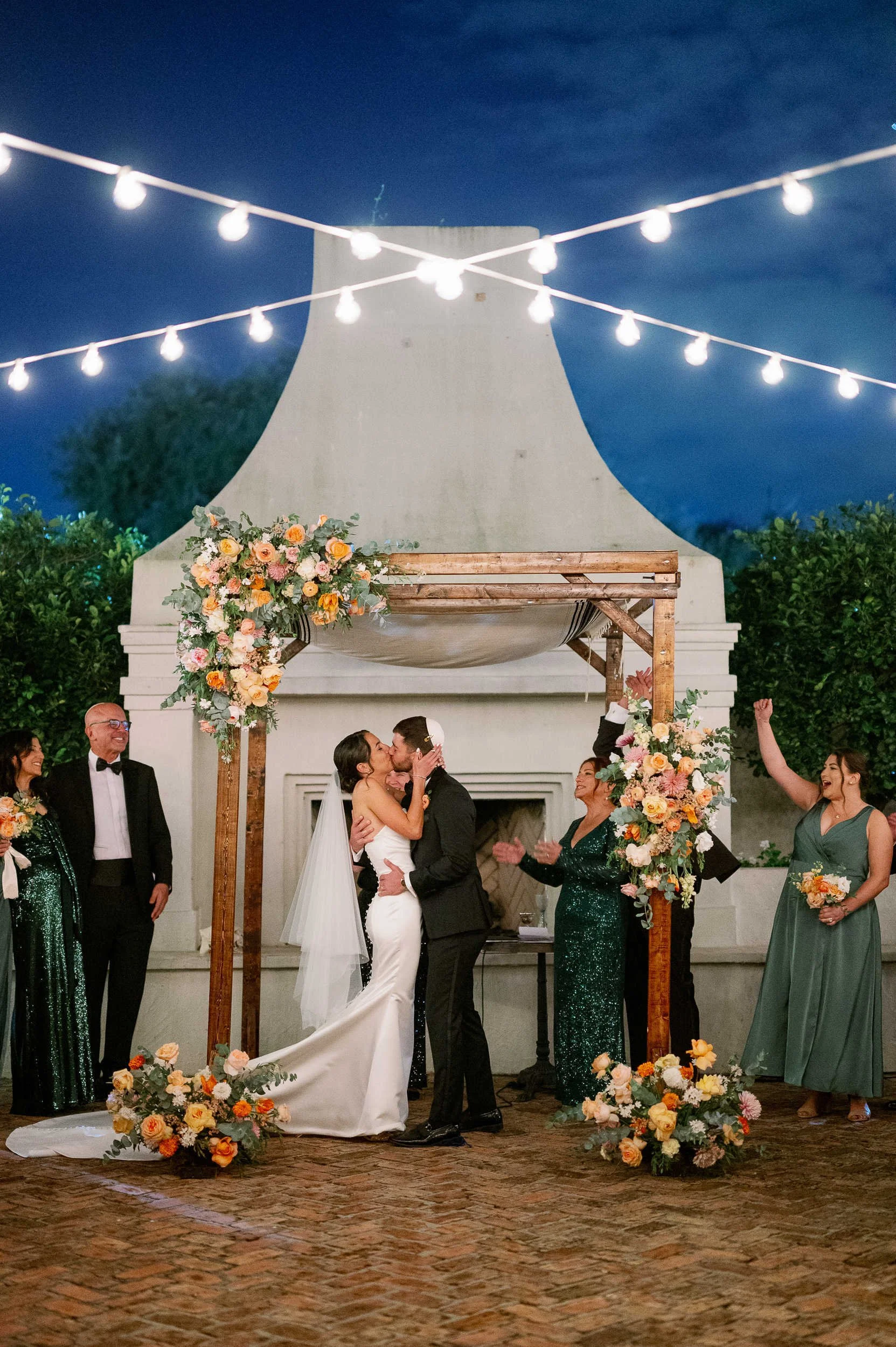 Il Mercato Wedding ceremony fireplace first kiss Photography