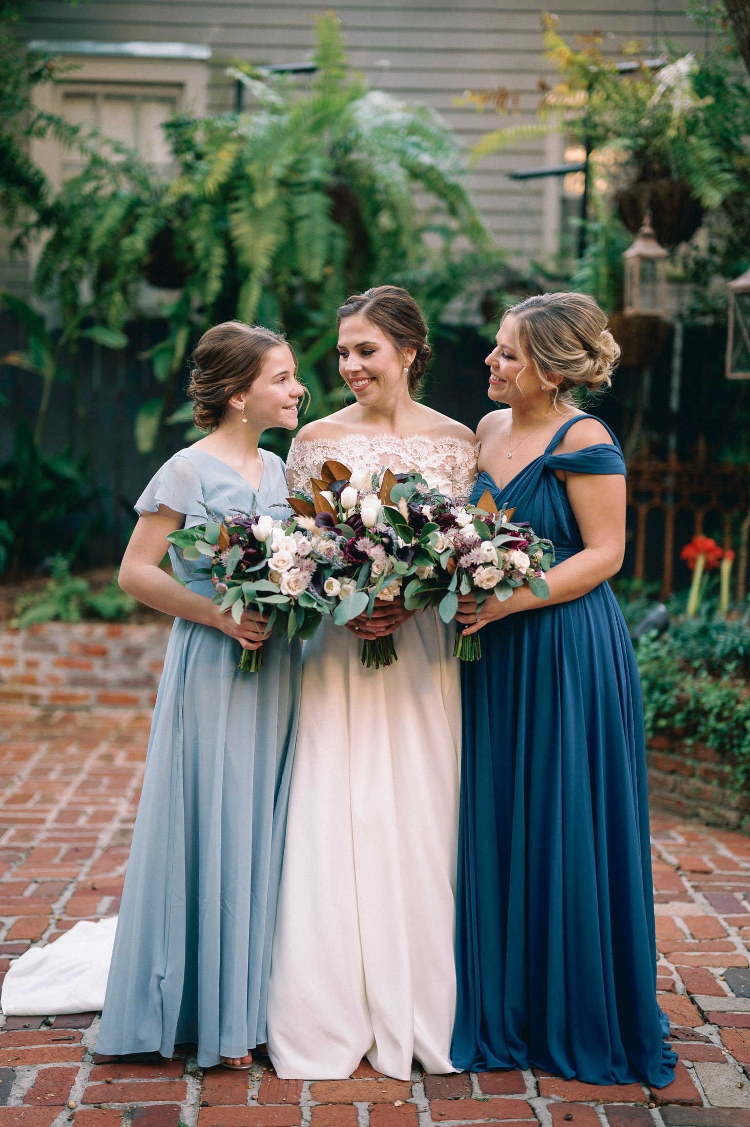 bride-bridesmaids-garden-courtyard-new-orleans-wedding.jpg