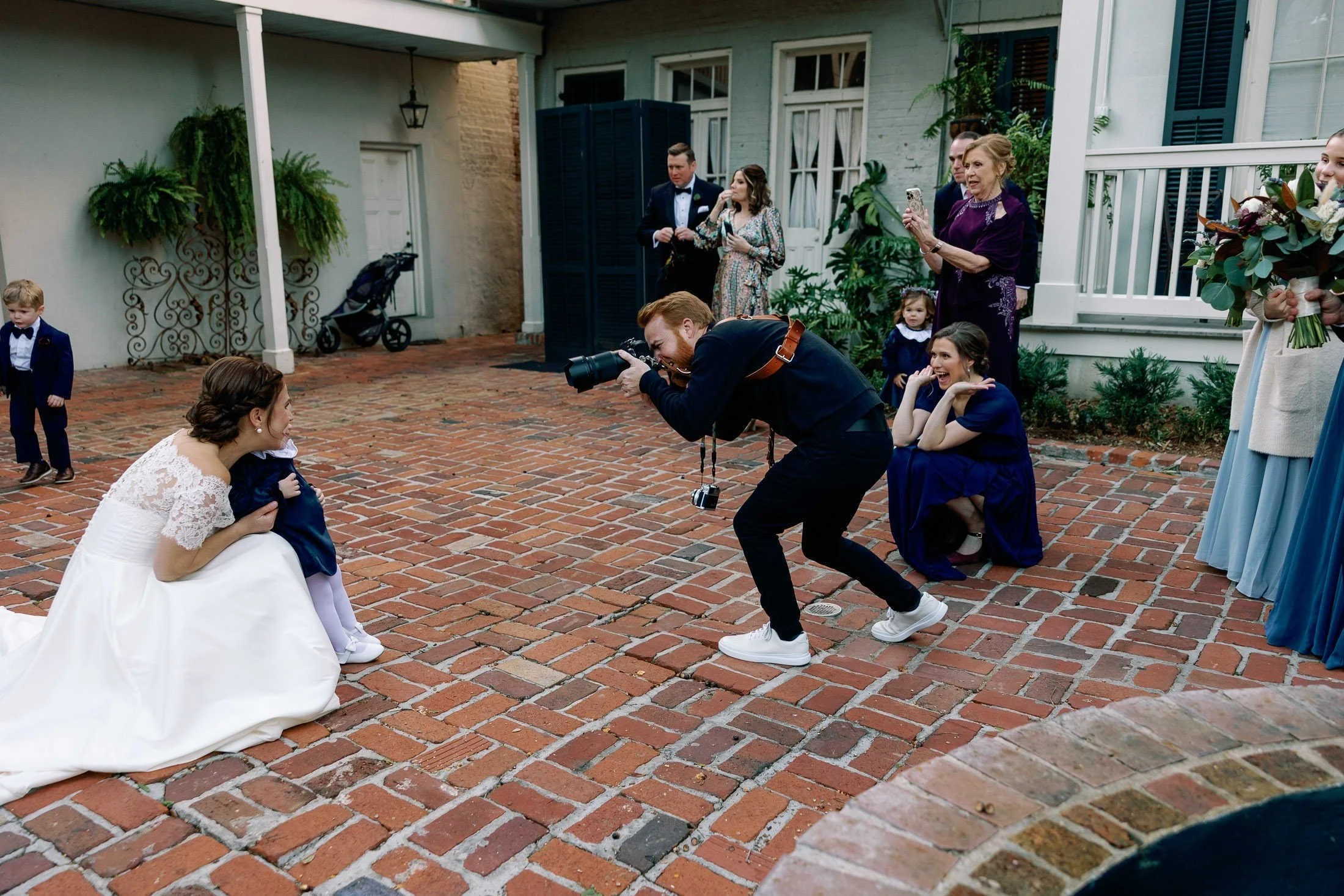 behind-scenes-wedding-photographer-courtyard-new-orleans.jpg