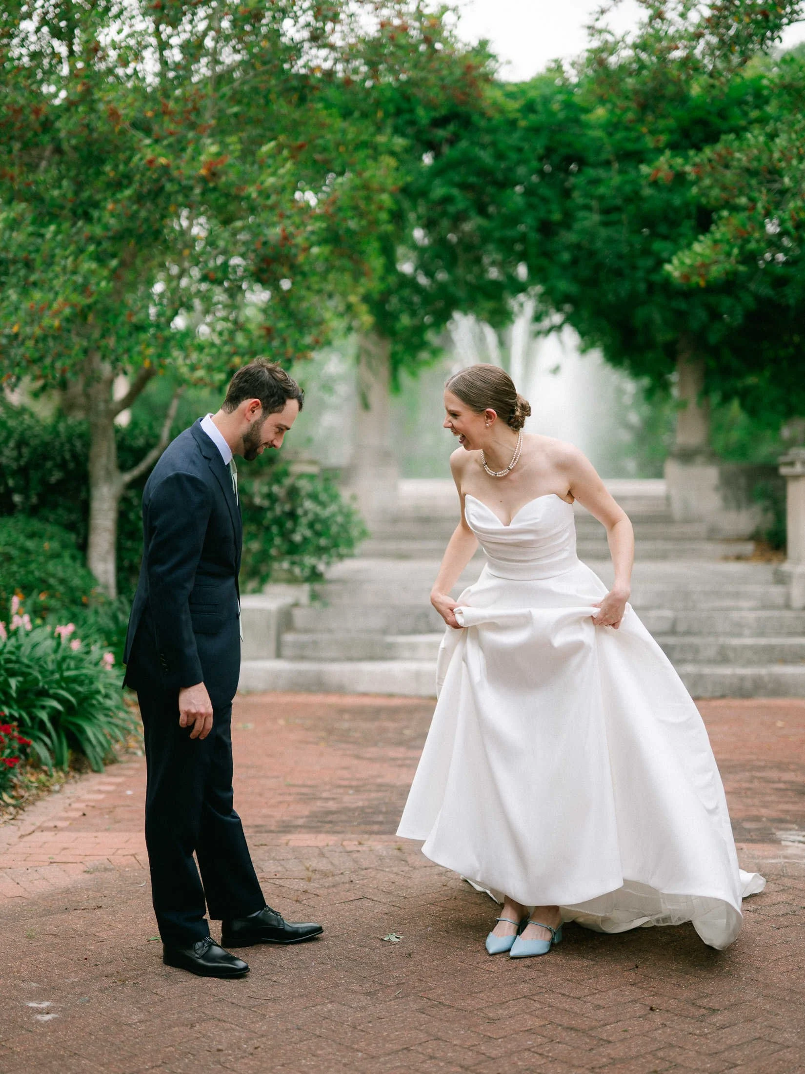 bride-groom-first-look-popp-fountain-garden-new-orleans-wedding.jpg