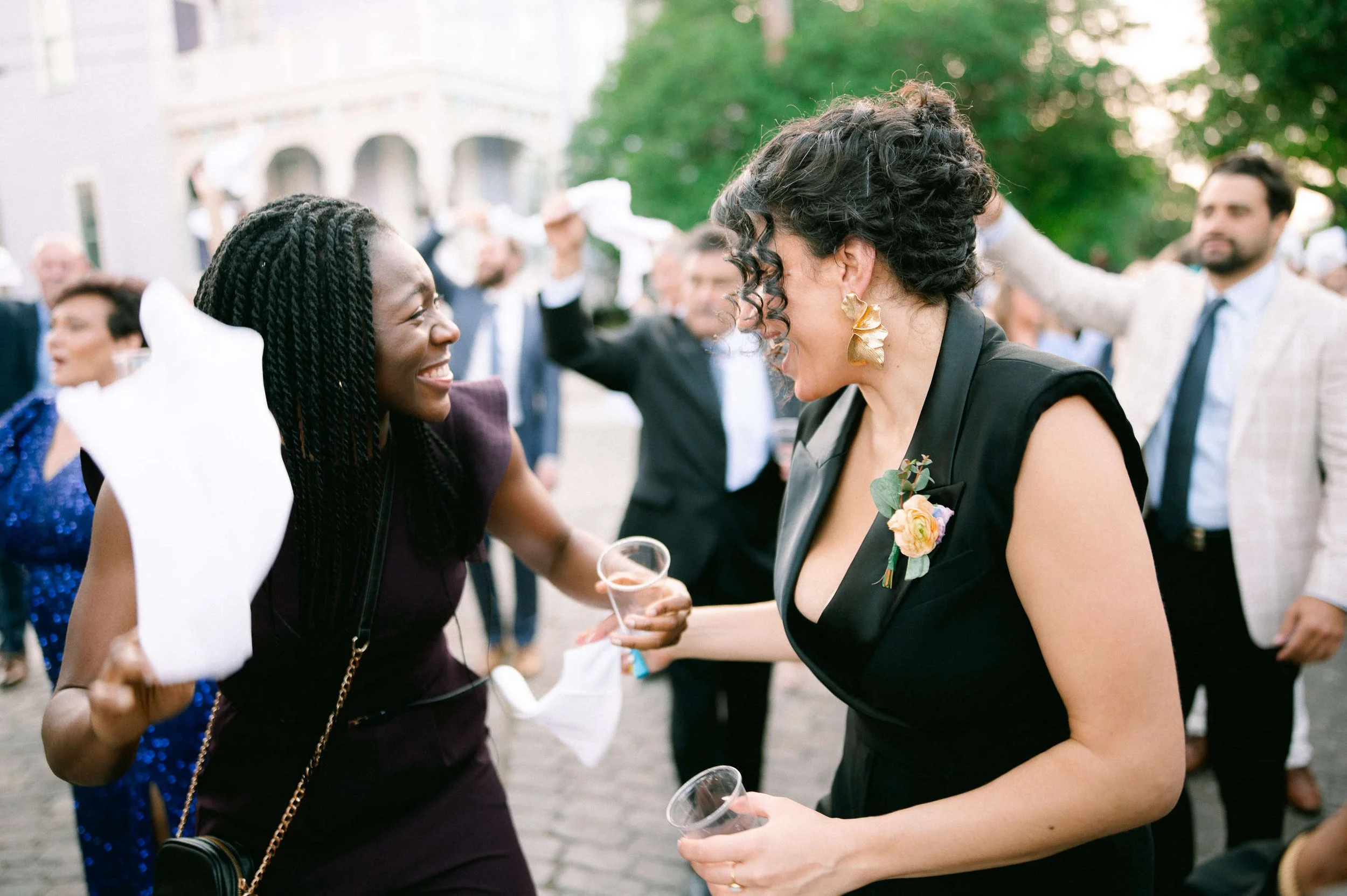 guests-celebrating-second-line-felicity-church-new-orleans-inclusive-wedding.jpg