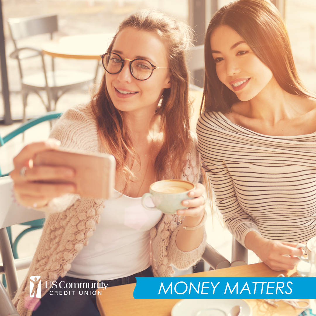 Two women taking a selfie on a smartphone