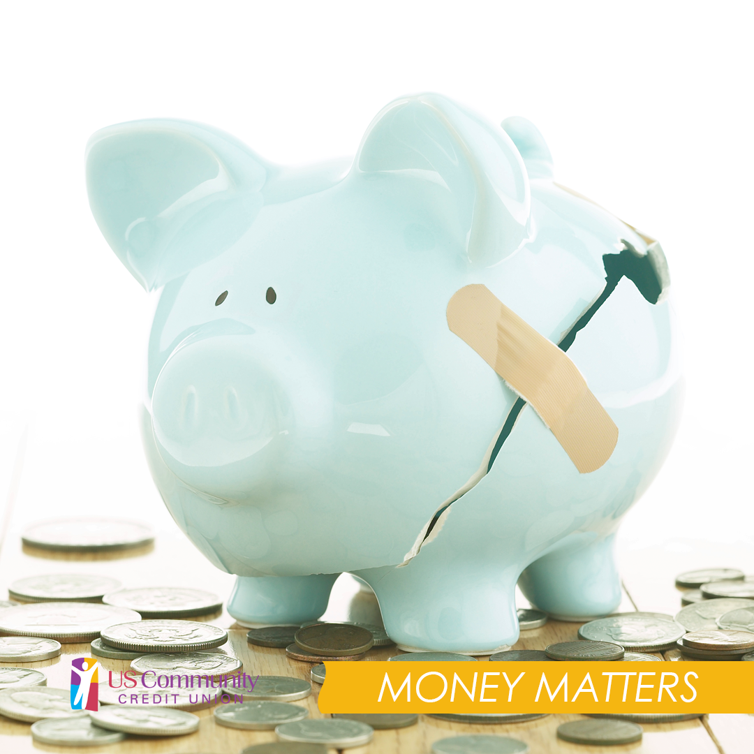 A broken piggy bank with a bandage on the crack