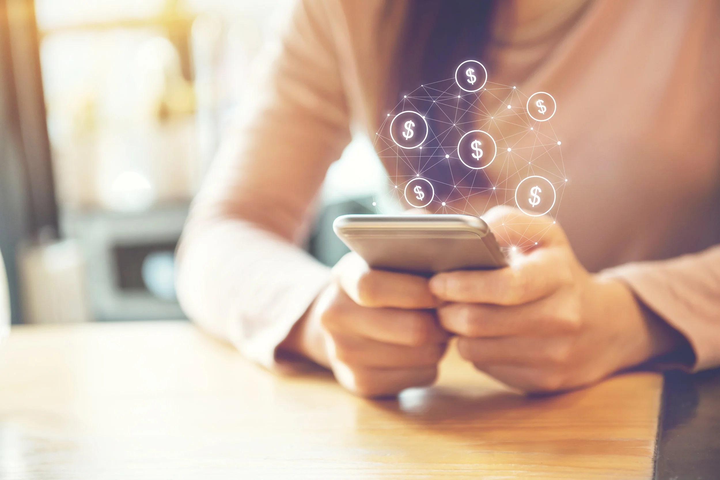 Woman holding a smartphone.