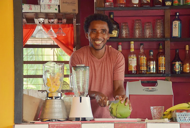 Mango pipa preparation at Madre Tierra restaurant