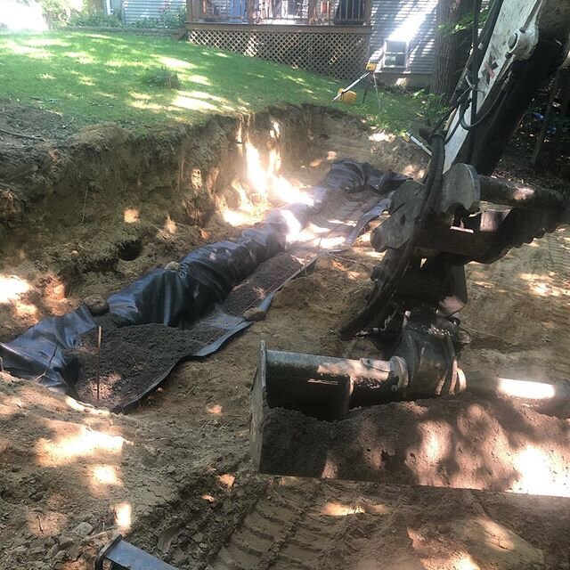 Today we got some retaining wall prep done for Monday. Then after work we went to do more work and prepped this electrical trench and made this set up to make running wire tomorrow easier. #mossyrocklandscaping #excavation #trenchin #bobcatequipment 