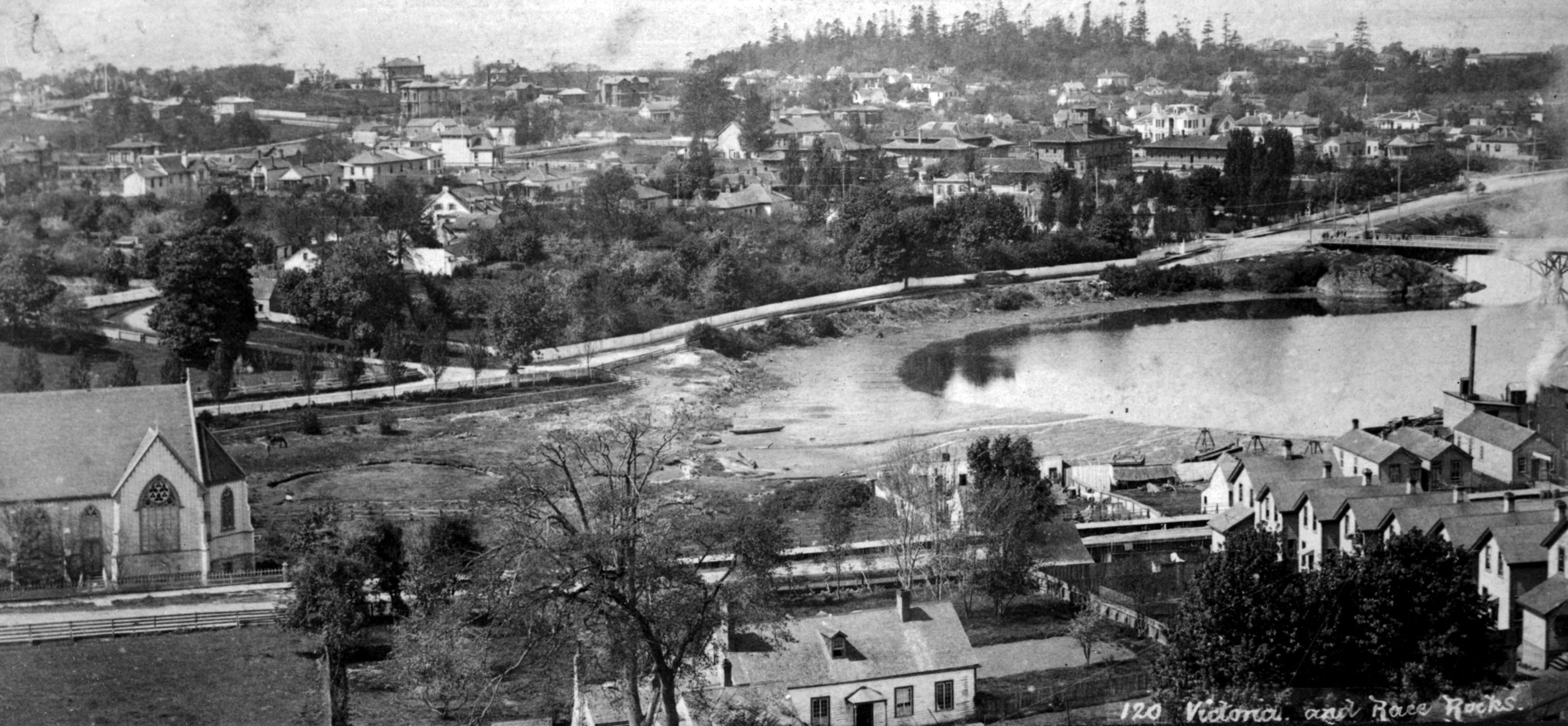 View of Victoria from Church Hill, looking southwest towards James Bay; Church of Our Lord at left, Birdcages across the James Bay mudflats. Image courtesy of the Royal B.C. Museum - B.C. Archives