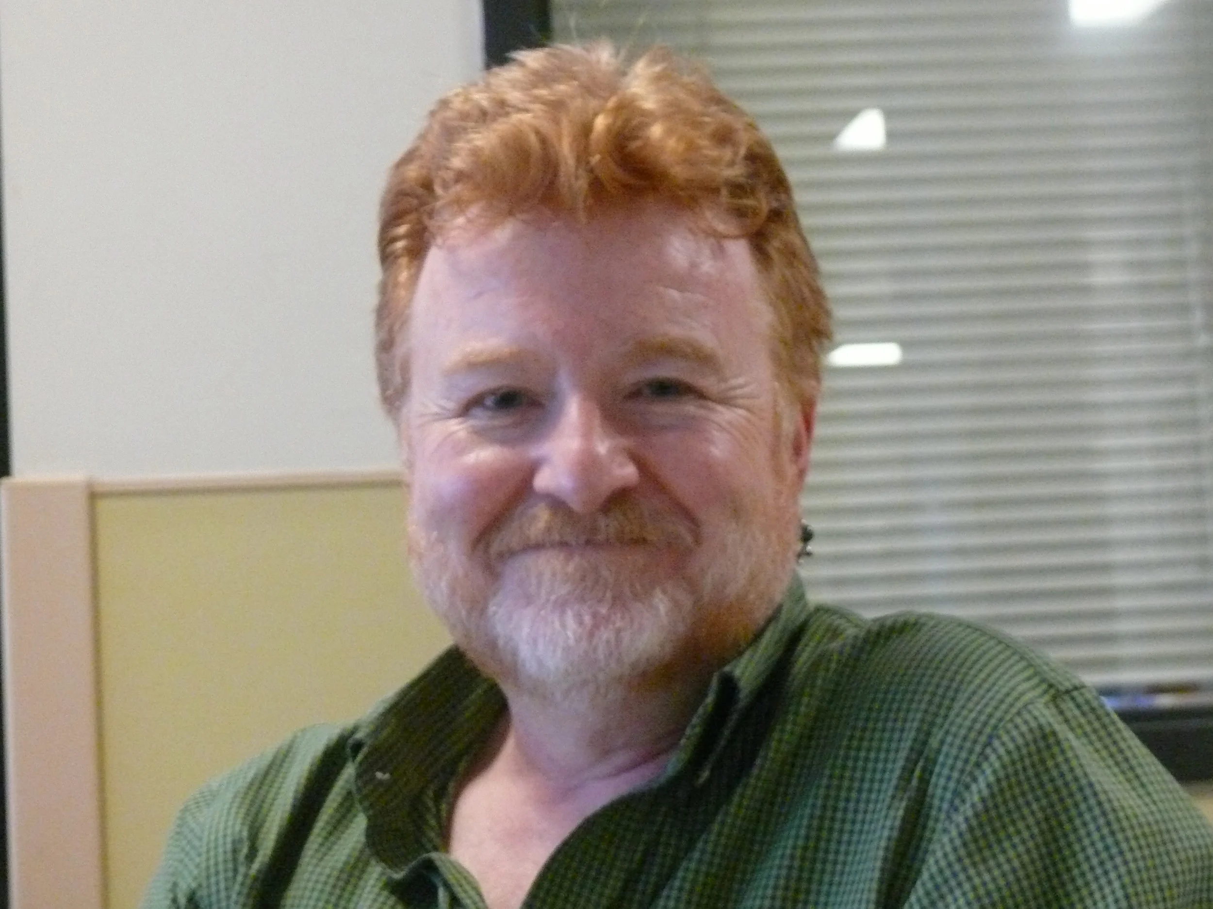 Grant McKenzie, director of communications at Our Place. Photo by Rita Button.
