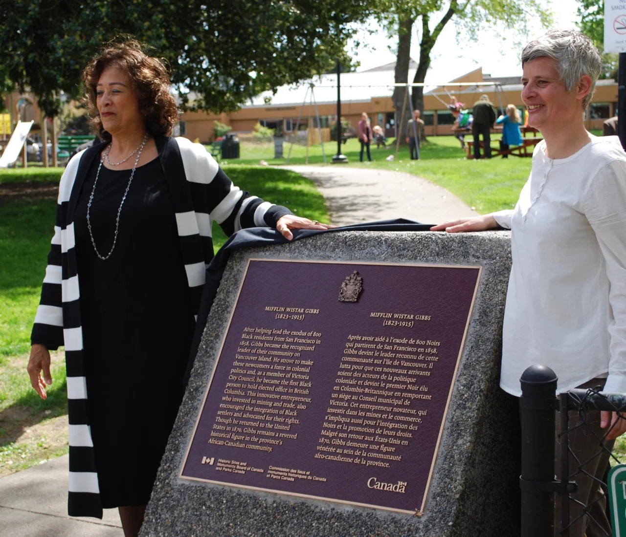 Above Mayor Lisa Helps and Dr. Verna Gibbs unveil plaque honouring Mifflin Wistar Gibbs . Photo by Robert Hawkes.