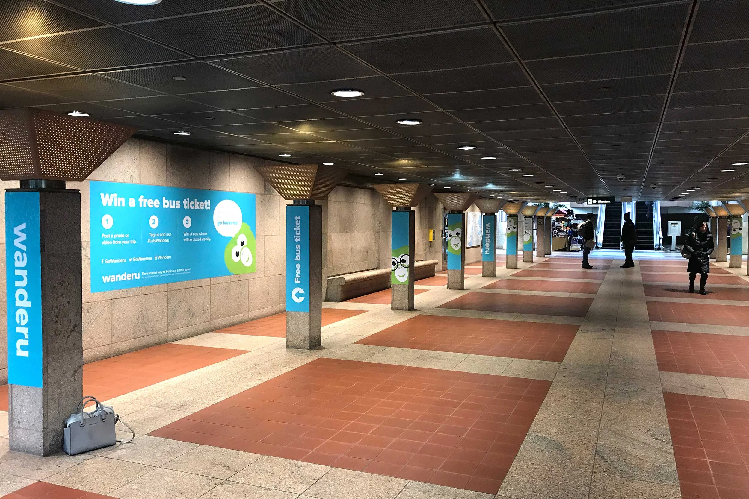 Wanderu South Station takeover campaign • entrance to bus terminal