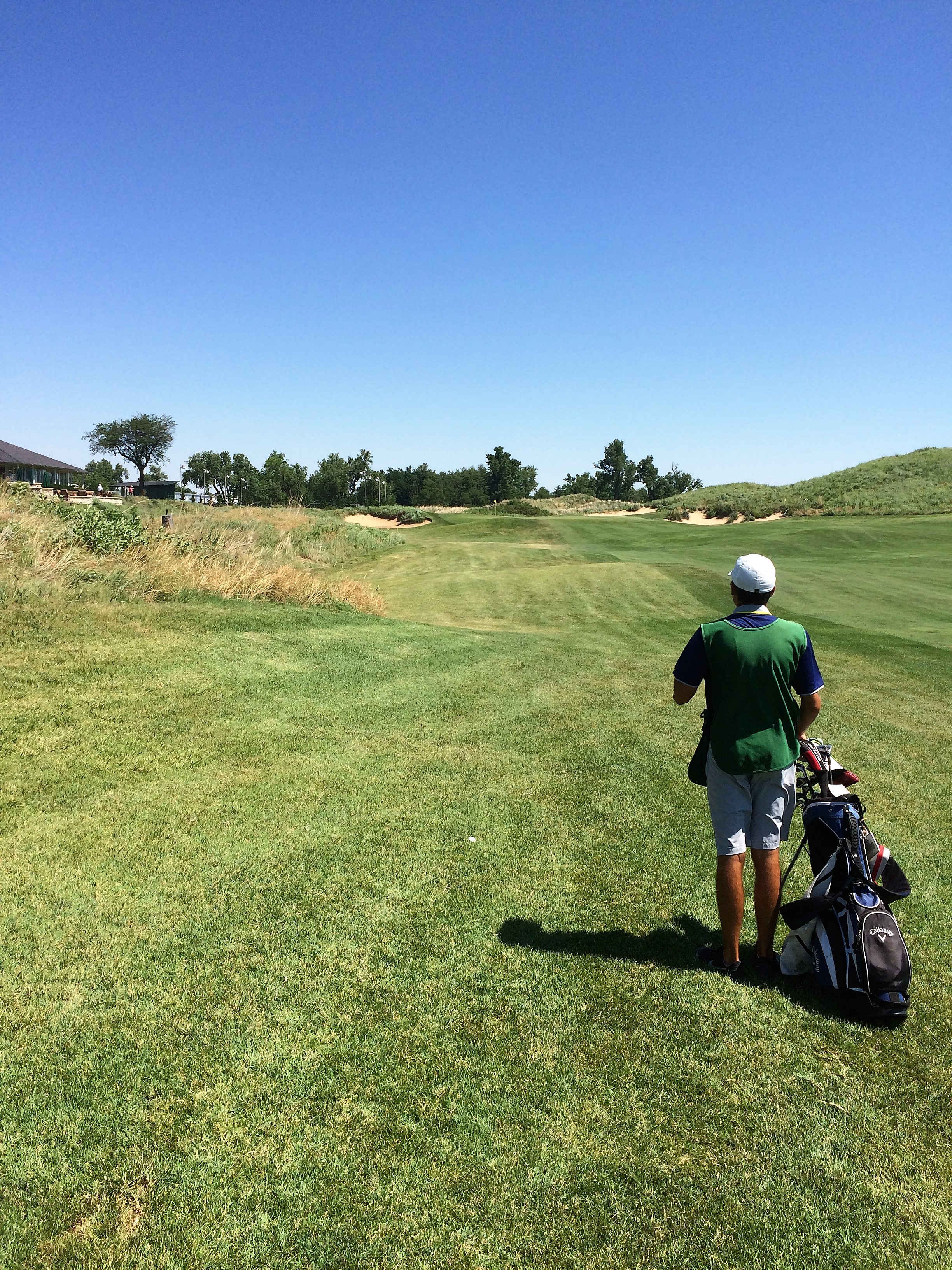 Mac standing next to where my drive on 18 ended up
