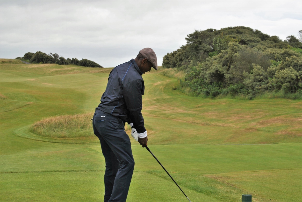 Preparing to hit a blind drive on the first tee