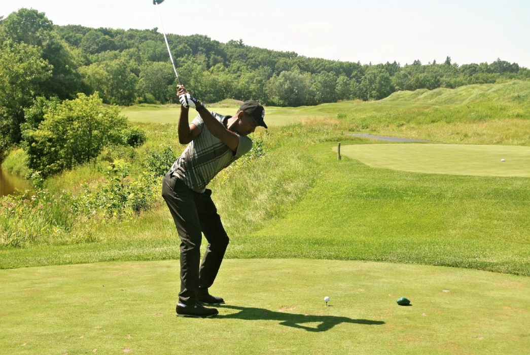 Teeing off on the first hole