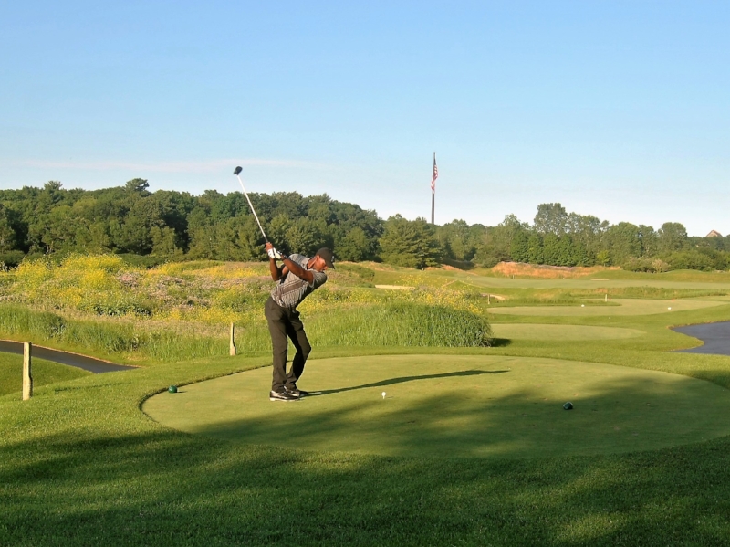 Teeing off on the Par 5 sixteenth hole