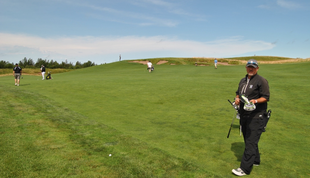 My pop up drive landed just off the fairway. As you can see there is a blind approach shot. The green is over the bunkers.