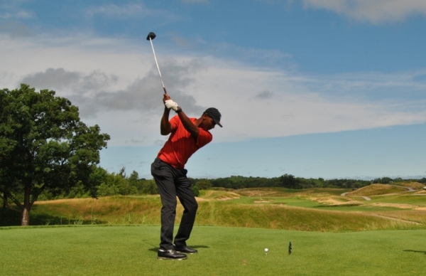 Teeing off on the fourth hole.