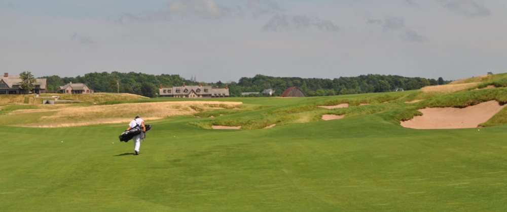 Three of our drives on 18 were aligned in the middle of the fairway. The fourth one is just short of the bunker on the right.