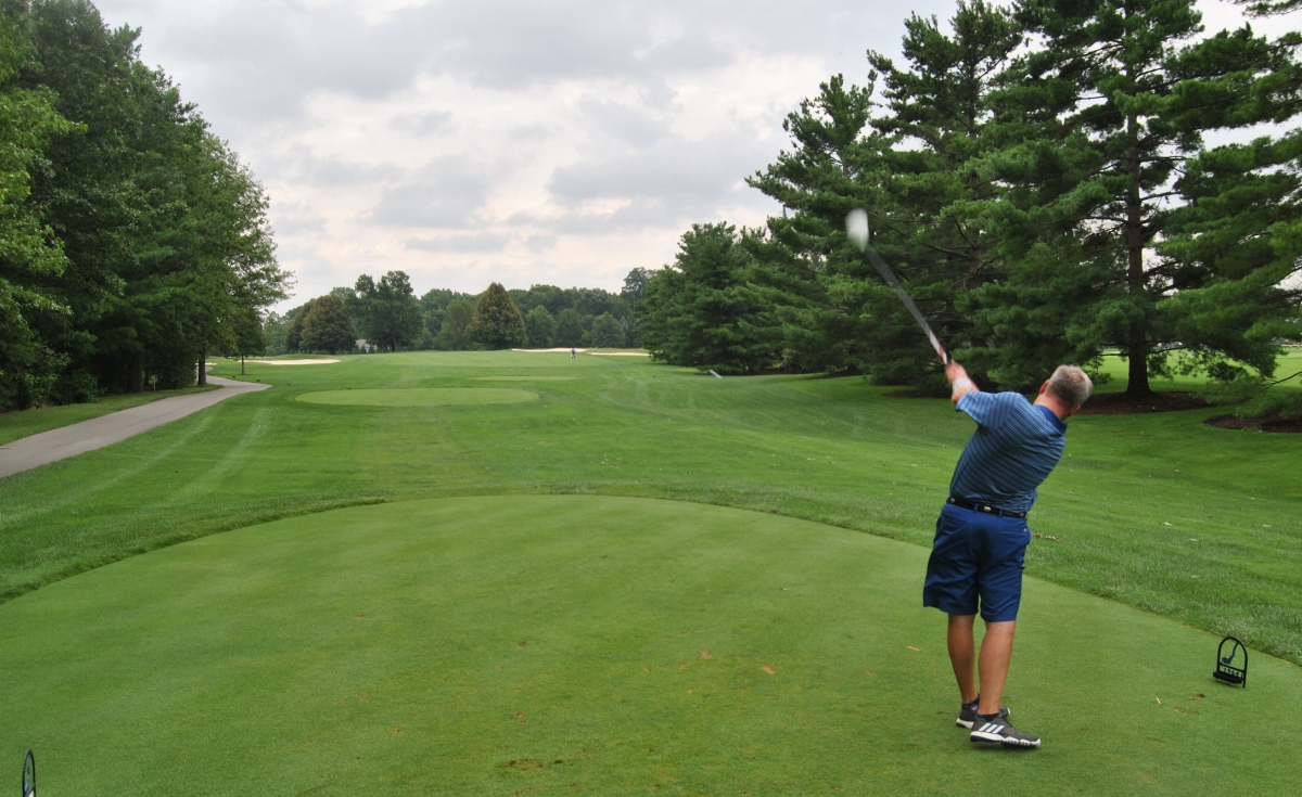 Brian hits his drive on the second hole