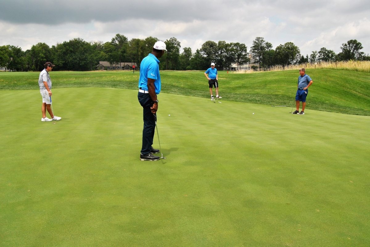 Watching my birdie putt on 17.