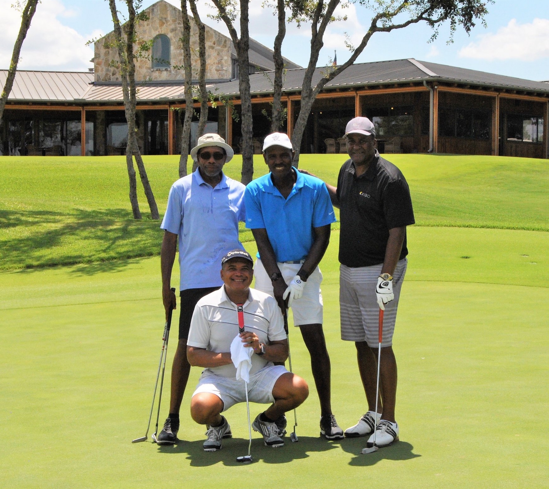 Dr. Young, Kenny, Ken and me after on round. What an amazing day!