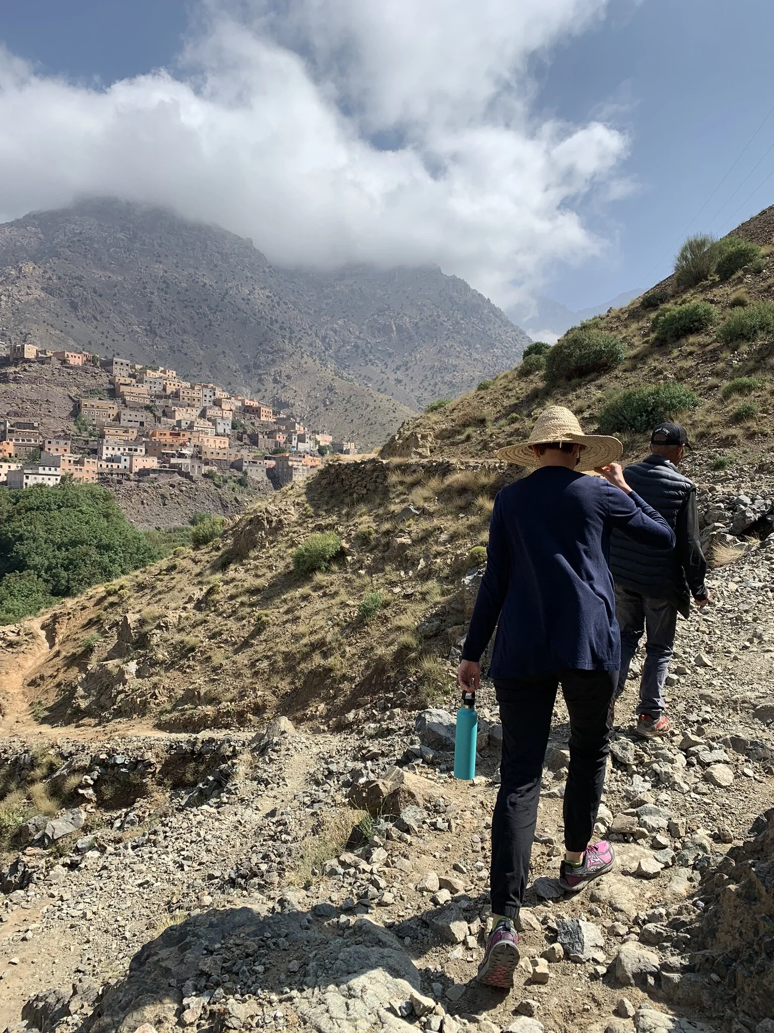 Clutching Old Water Bottles