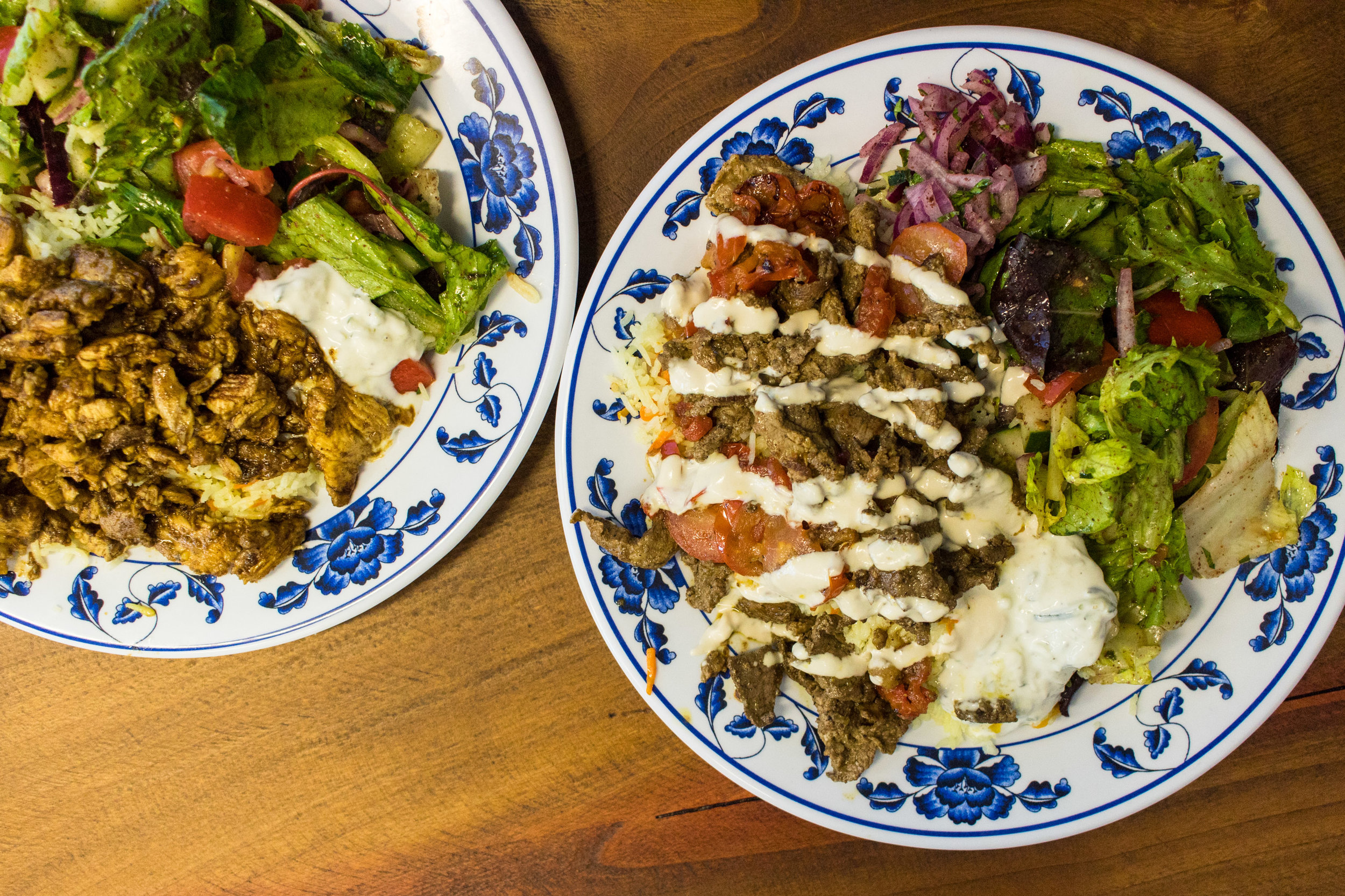 Left: Pomegranate Chicken over Rice. Right: Meat over Rice